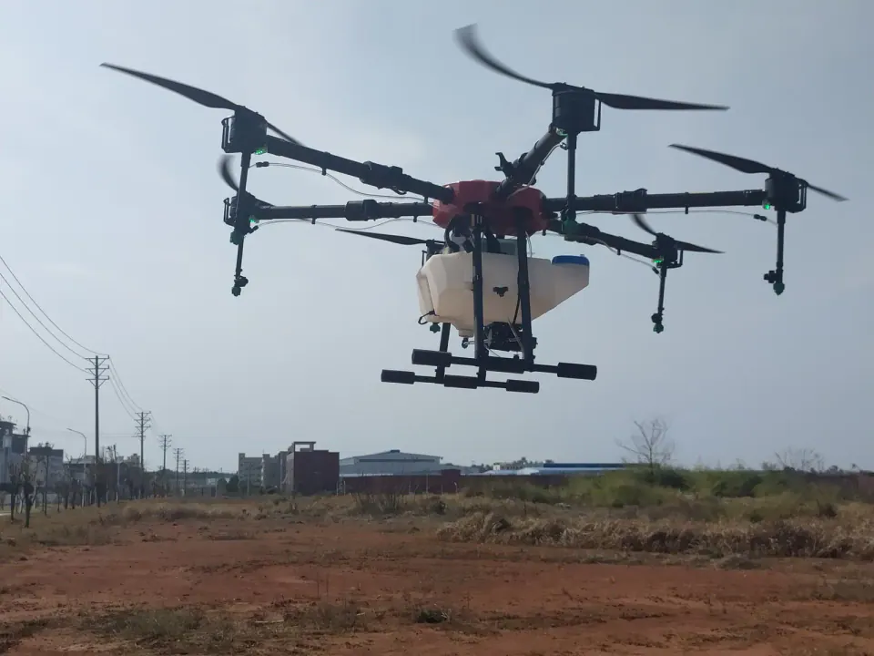 TYI 6 Axis 16L agricultural drone operating over farmland